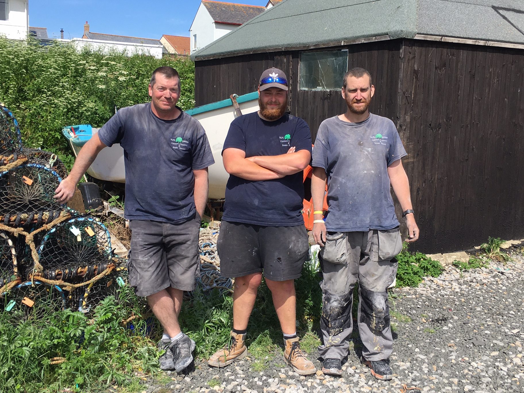 These Beadnell coble fishermen's sons and grandsons now work for the local joiner, 2021